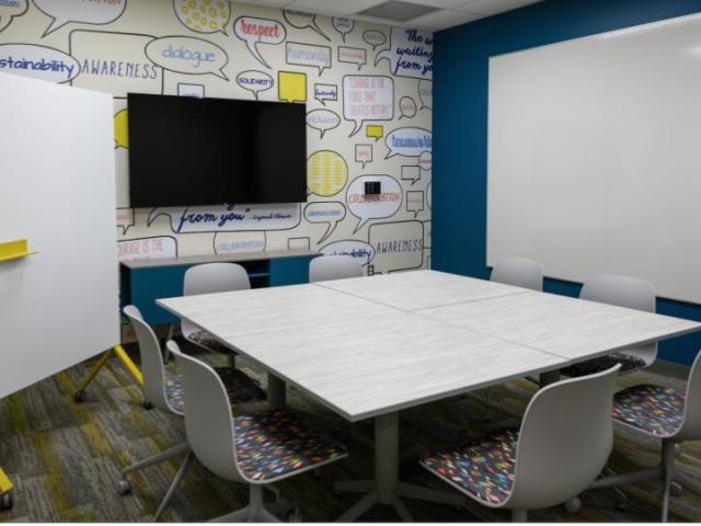 white board in a meeting room with table