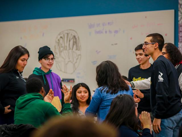A group of students at an event in the Trotter building
